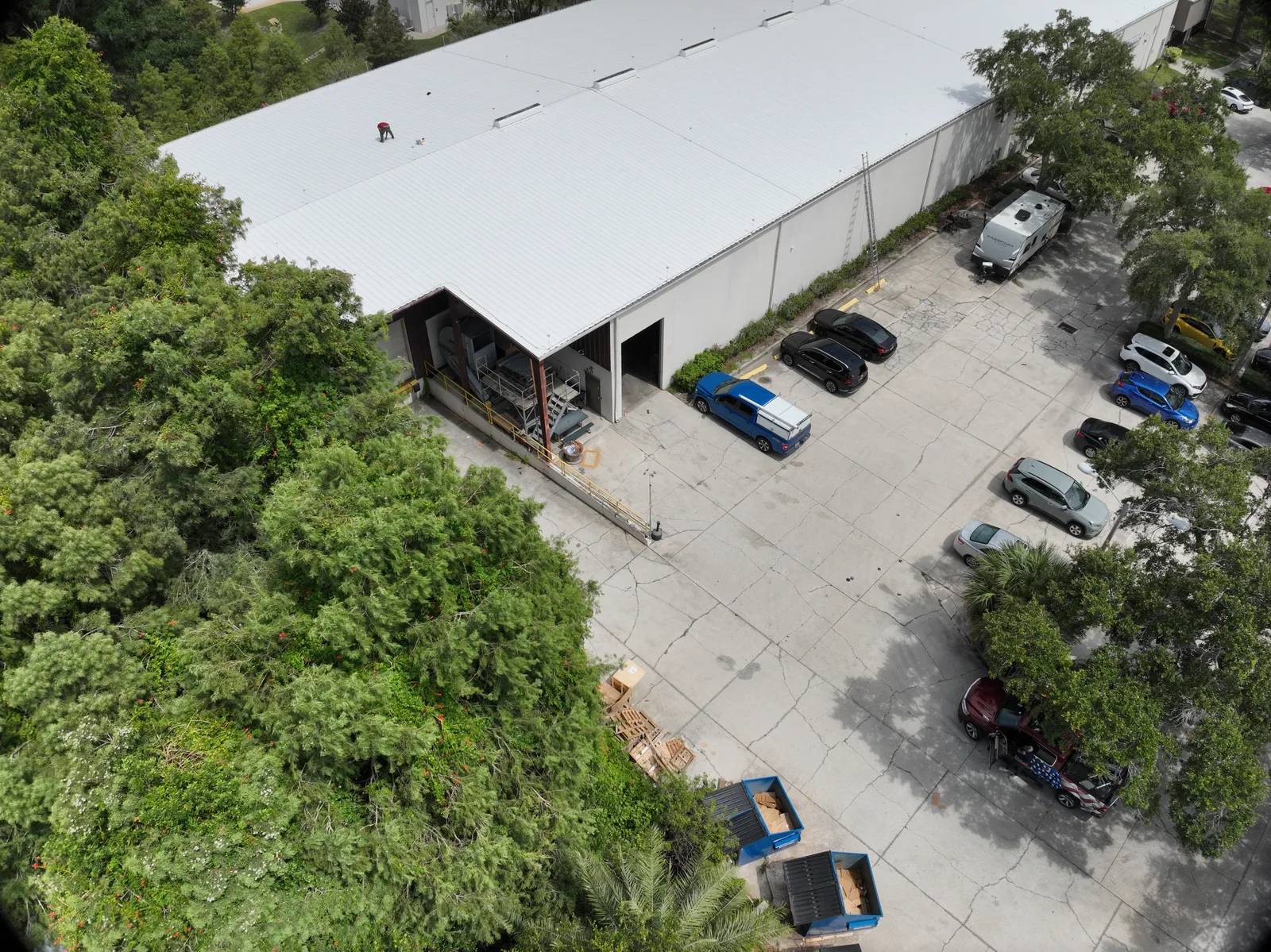 A later property view — A documented phase from the roof archive, showing the building and its setting.